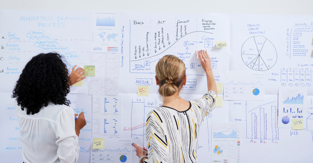 Indian B2B leadership team discussing branding strategy and market repositioning in a corporate boardroom