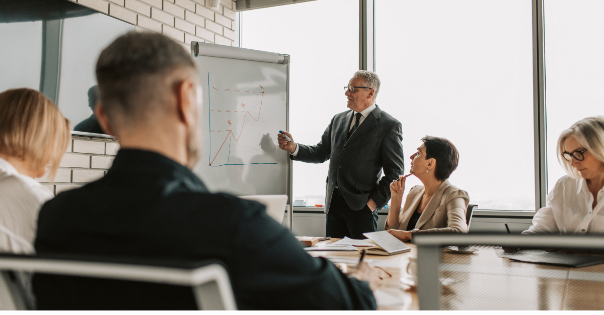 Senior Indian executives discussing B2B branding India strategy in a professional corporate meeting