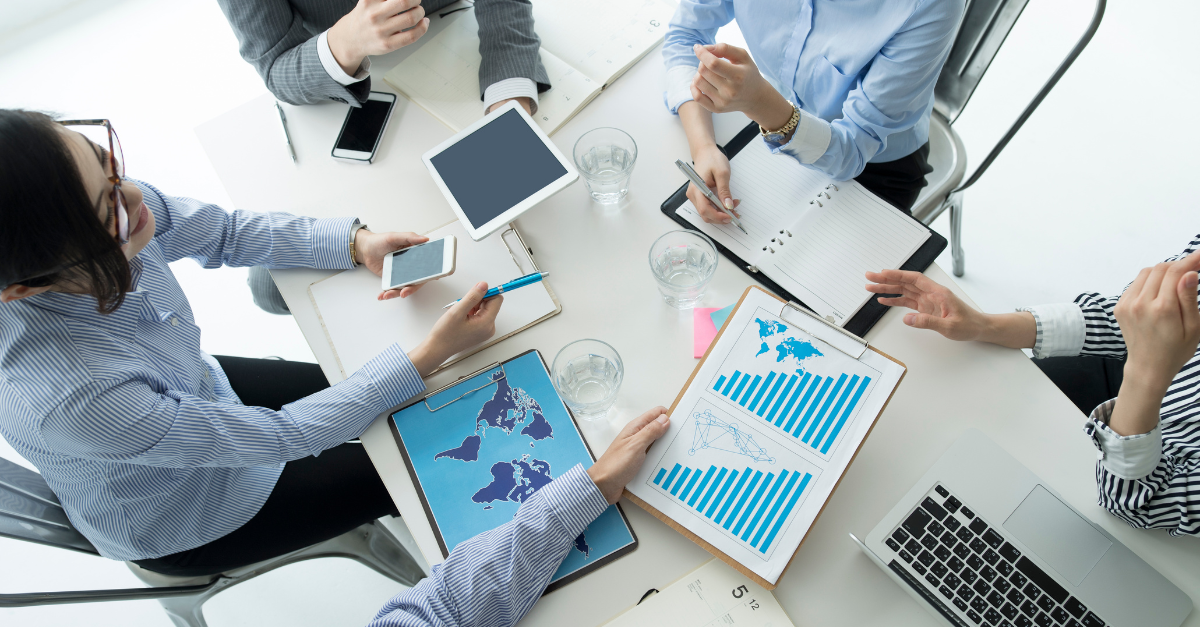 ndian B2B companies reviewing identical marketing strategies in a corporate setting