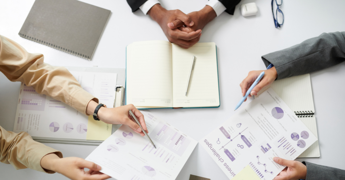 B2B marketing team discussing outcome led strategy focused on business results, enterprise growth, and value driven go to market approach | B2B Marketing Agency | Mumbai, India